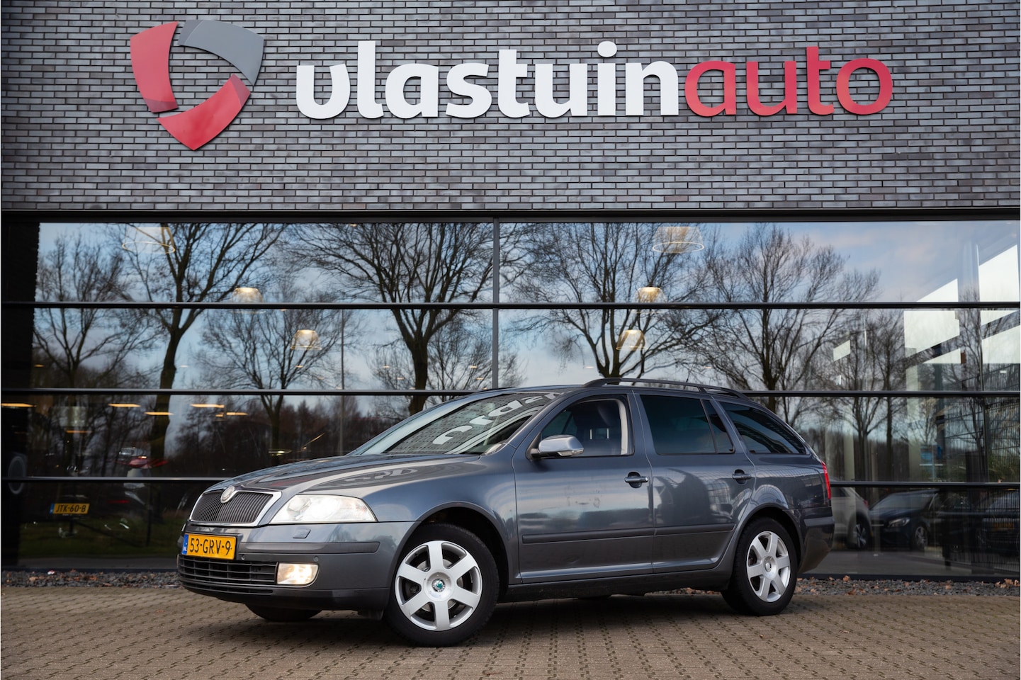 Skoda Octavia Combi - 1.6 FSI Elegance Attractive Business 1.6 FSI Elegance Attractive Business , Cruise control, Navigatie, - AutoWereld.nl