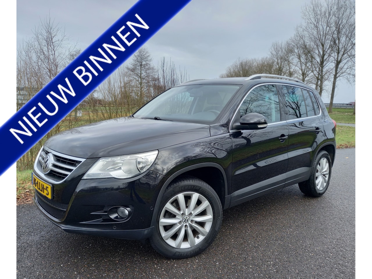 Volkswagen Tiguan - 1.4 TSI Sport&Style - AutoWereld.nl
