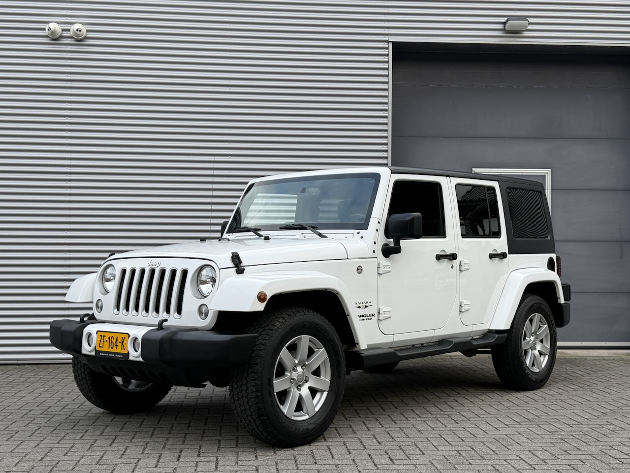 Jeep Wrangler Unlimited - 3.6 Sahara I Aut. I Hardtop I Leder I 4WD I 79000 km - AutoWereld.nl