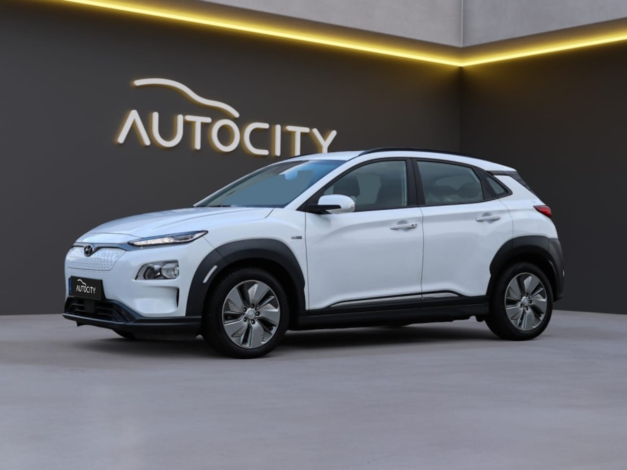 Hyundai Kona Electric - EV Comfort 64 kWh 100% SOH l Warmtepomp l 3 Fase - AutoWereld.nl