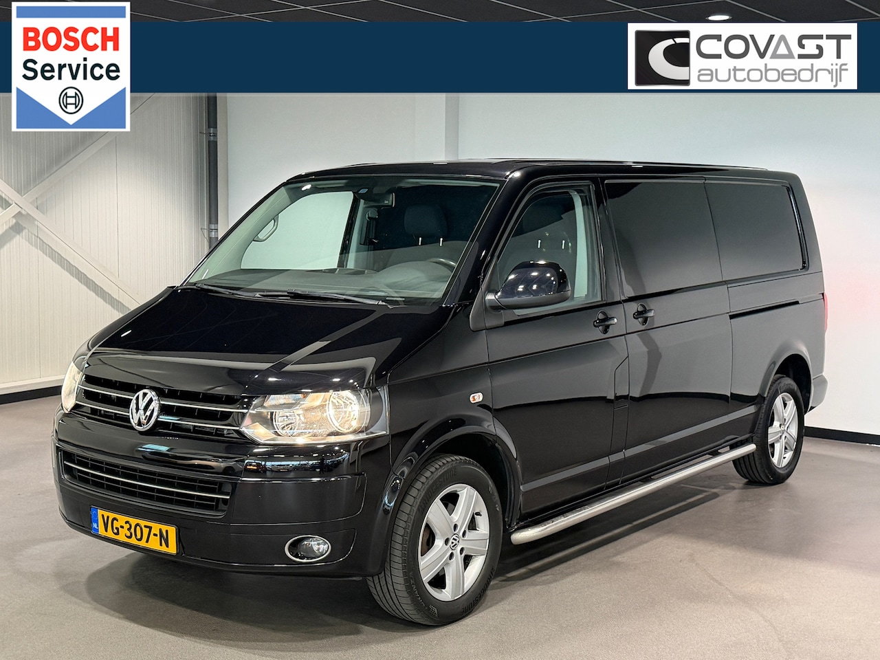 Volkswagen Transporter - 2.0 TDI 140pk L2H1 Comfortline 2xSchuifdeur|Airco|Navi|Nette Bus! - AutoWereld.nl
