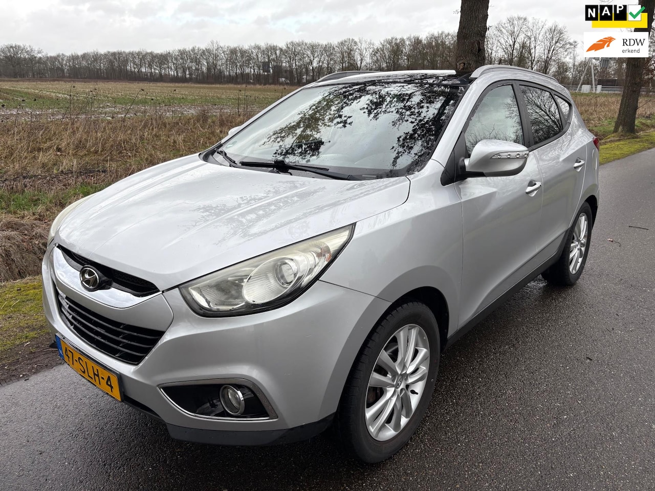 Hyundai ix35 - 2.0i i-Catcher Airco/APK/Dakje/Stoelverw./Motor tikt/Leer - AutoWereld.nl