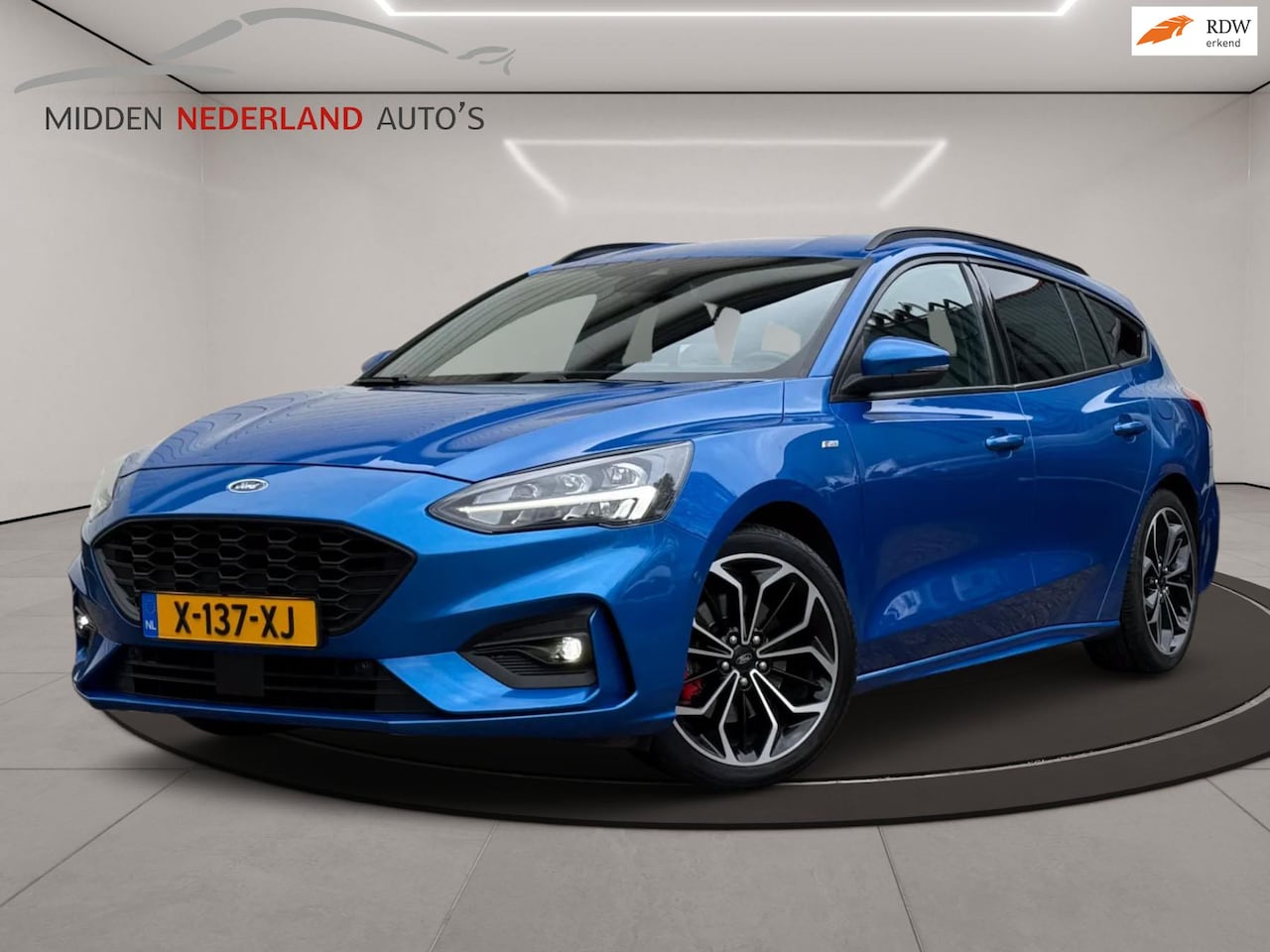 Ford Focus Wagon - 1.5 EcoBoost Vignale * ST-LINE * AUTOMAAT * TREKHAAK * STOEL & STUUR VERWARMING * - AutoWereld.nl