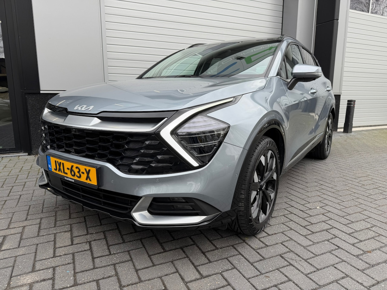 Kia Sportage - 1.6 T-GDi Plug-in Hybrid AWD DynamicLine / SOH 100% / Panorama / 360 camera - AutoWereld.nl