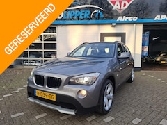 BMW X1 - sDrive18i Executive /Nieuwe apk bij aflevering/Lm velgen/Navi/Trekhaak/Schuifdak