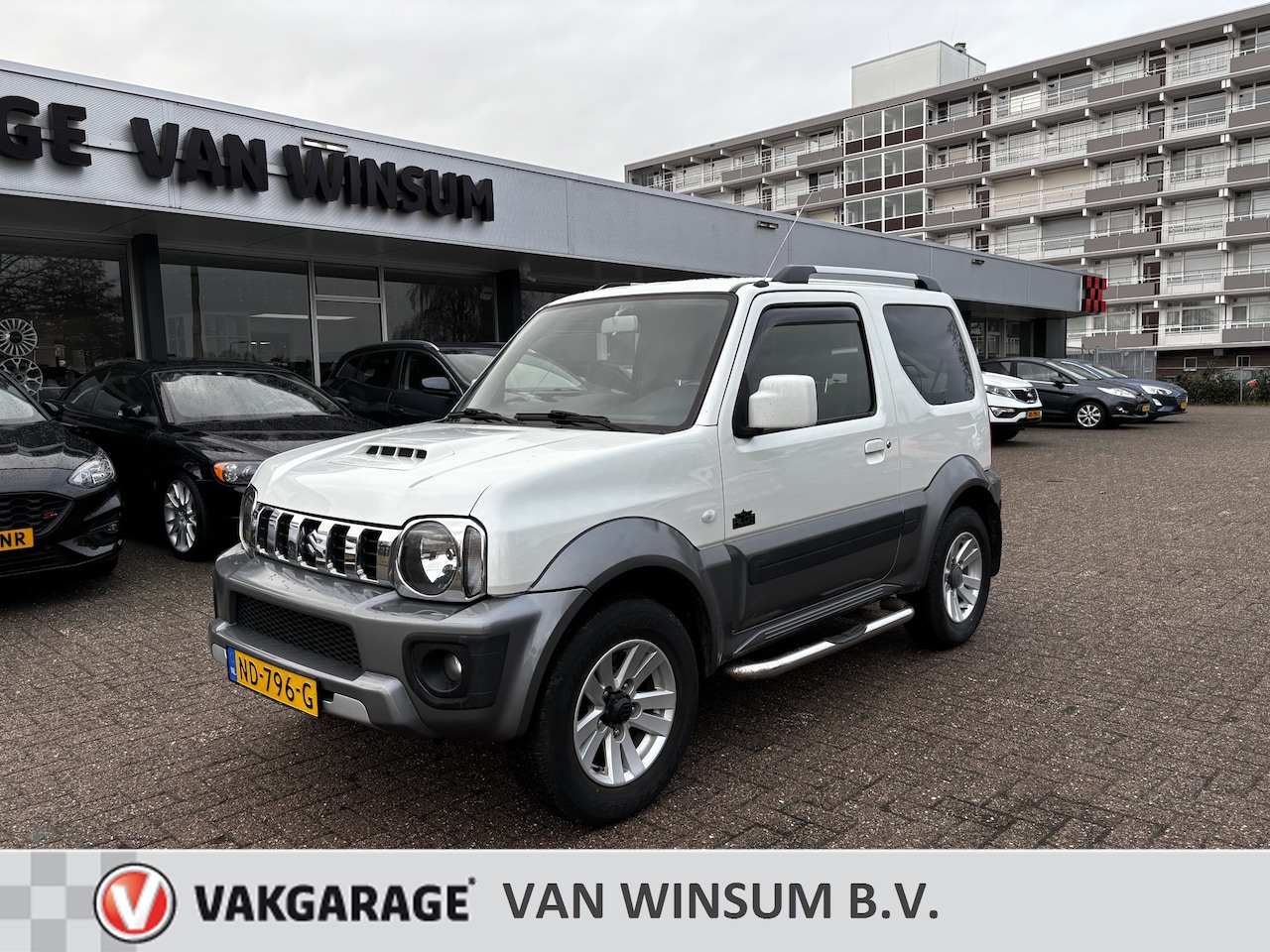 Suzuki Jimny - 1.3 Exclusive airco lmv parelmoerwit - AutoWereld.nl