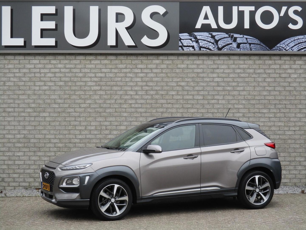 Hyundai Kona - 1.0 T-GDI PREMIUM Leer/Navi/Camera/Trekhaak - AutoWereld.nl