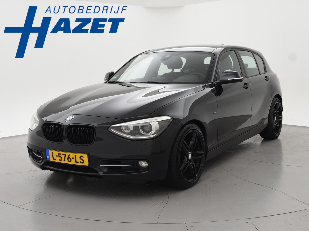 BMW 1-serie - 118i 5-DEURS 170 PK AUT. SPORT + 18 INCH | STOELVERW. | SPORTSTOELEN | NAVIGATIE - AutoWereld.nl