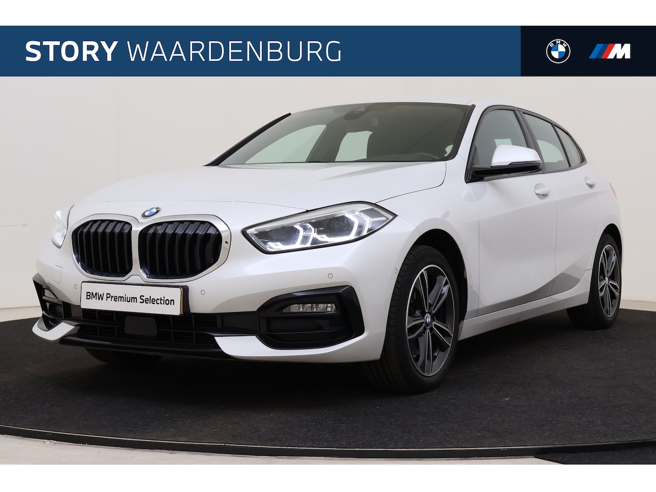 BMW 1-serie - 118i High Executive Automaat / Sportstoelen / Laserlicht / Achteruitrijcamera / Cruise Con - AutoWereld.nl