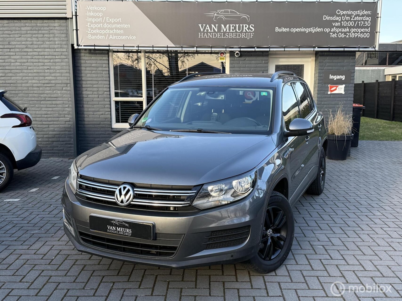 Volkswagen Tiguan - 1.4 TSI Sport&Style, Trekhaak, NW Distributie, Apk 04-2027 - AutoWereld.nl