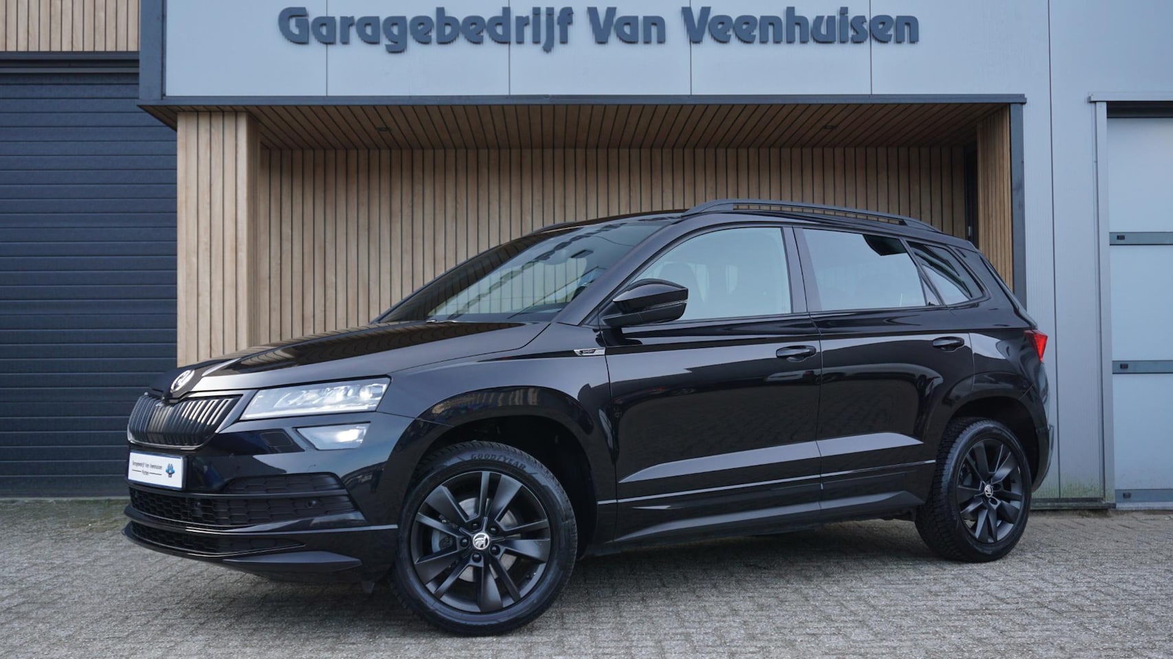Skoda Karoq - 1.5 TSI 150pk Sportline Business Virtual Navi A-Camera Sfeerverlichting Adaptive Cruise Ke - AutoWereld.nl