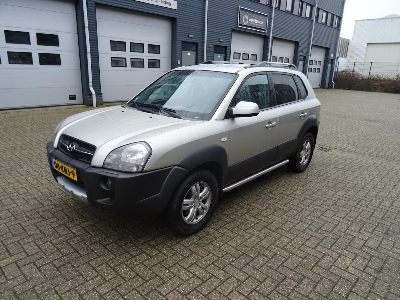 Hyundai Tucson - 2.0i Style Cross 2.0i Style Cross - AutoWereld.nl