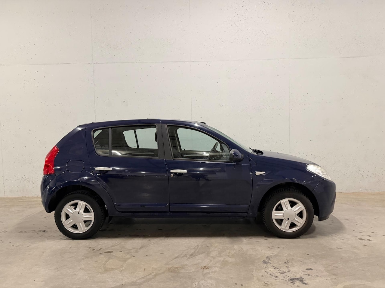 Dacia Sandero - 1.2 Lauréate Airco - AutoWereld.nl