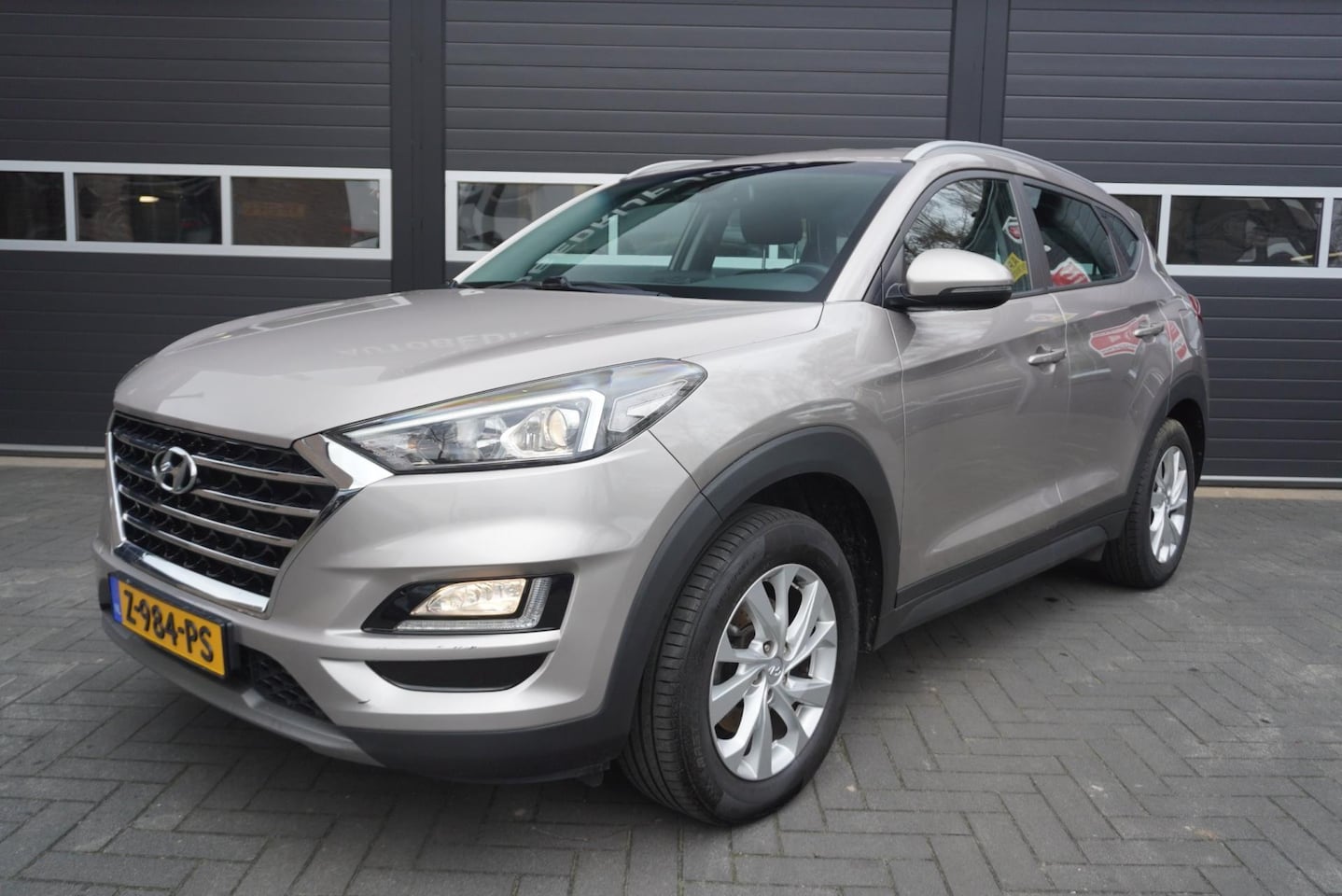 Hyundai Tucson - 1.6 T-GDI Comfort Airco/Navi/Camera/Cruise/Carplay/Trekhaak - AutoWereld.nl