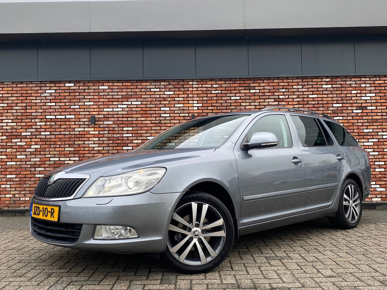 Skoda Octavia Combi - 1.4 TSI Ambition Cruise Trekhaak 130000km! - AutoWereld.nl