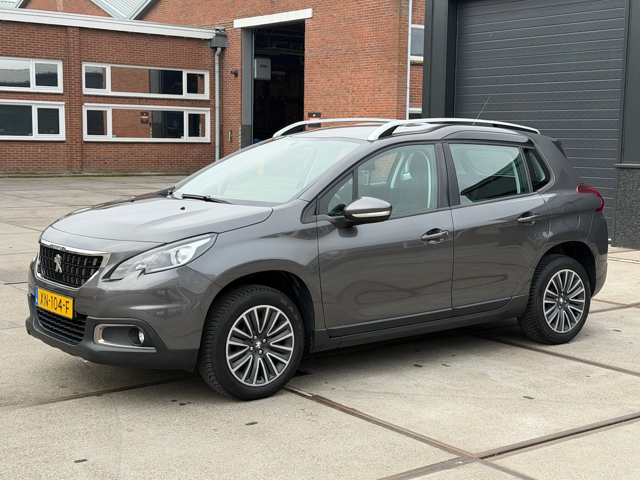 Peugeot 2008 - 1.2 PureTech Active Navi Cruise Pdc Trekhaak - AutoWereld.nl
