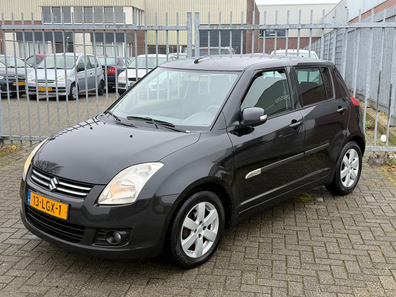 Suzuki Swift - 1.3 Limited 5 deurs 93PK! KMST NAP! AIRCO l STOELVERWARMING l ALCANTARA l CRUISE l LMV! DE - AutoWereld.nl