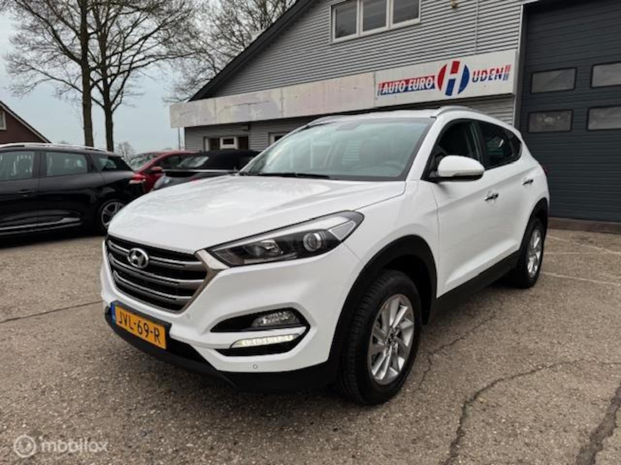 Hyundai Tucson - 1.6 GDi Premium Leder+Navi+Camera+N.A.P!! - AutoWereld.nl