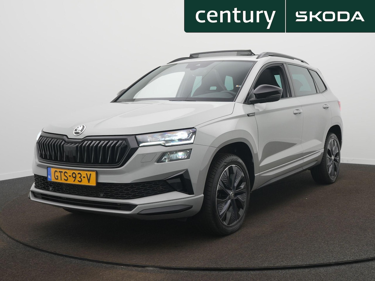 Skoda Karoq - 1.5 TSI ACT Sportline Business DSG / Elek. Trekhaak / Panodak / Camera - AutoWereld.nl