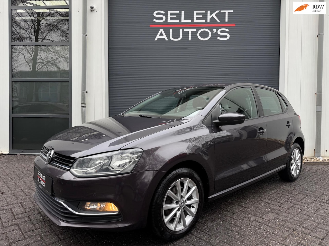 Volkswagen Polo - 1.2 TSI Lounge 90 Pk DSG Cruise/Climate/Navigatie/Bluetooth/PDC/Elekt Ramen/Elekt Spiegels - AutoWereld.nl