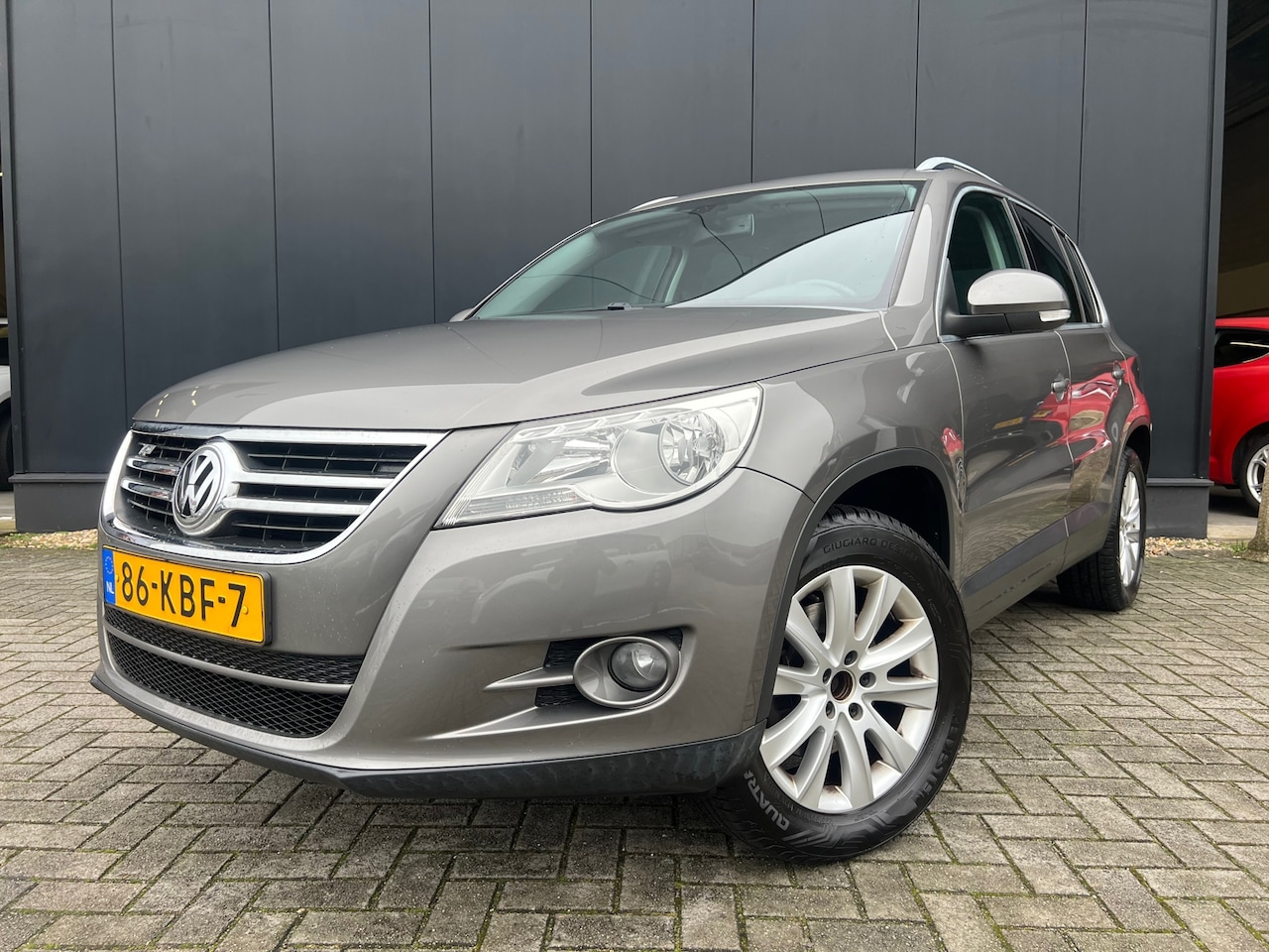 Volkswagen Tiguan - 1.4 TSI Sport&Style Trekh/Bose/Lmv/OrgNl! - AutoWereld.nl
