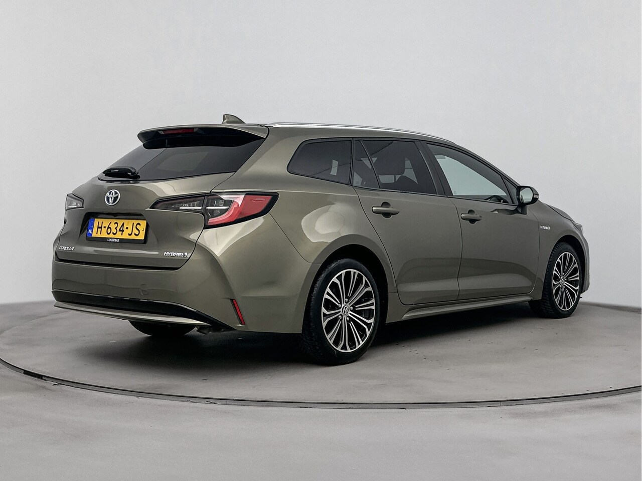 Toyota Corolla Touring Sports - 1.8 Hybrid First Edition | Apple Carplay/Android Auto | Stoelverwarming | - AutoWereld.nl