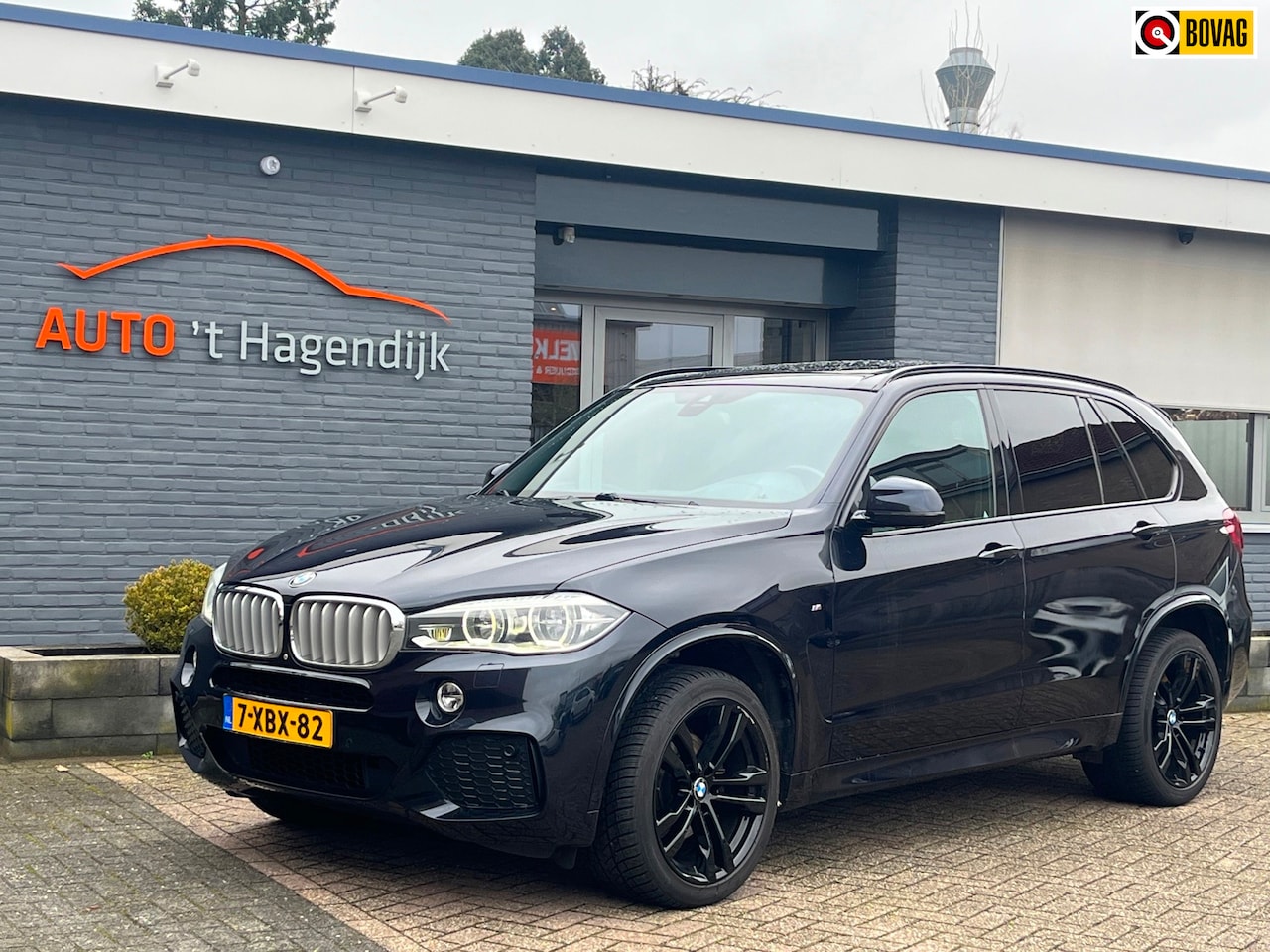 BMW X5 - XDrive30d M-Sport NWE KETTING pano trekh HUD H&K - AutoWereld.nl