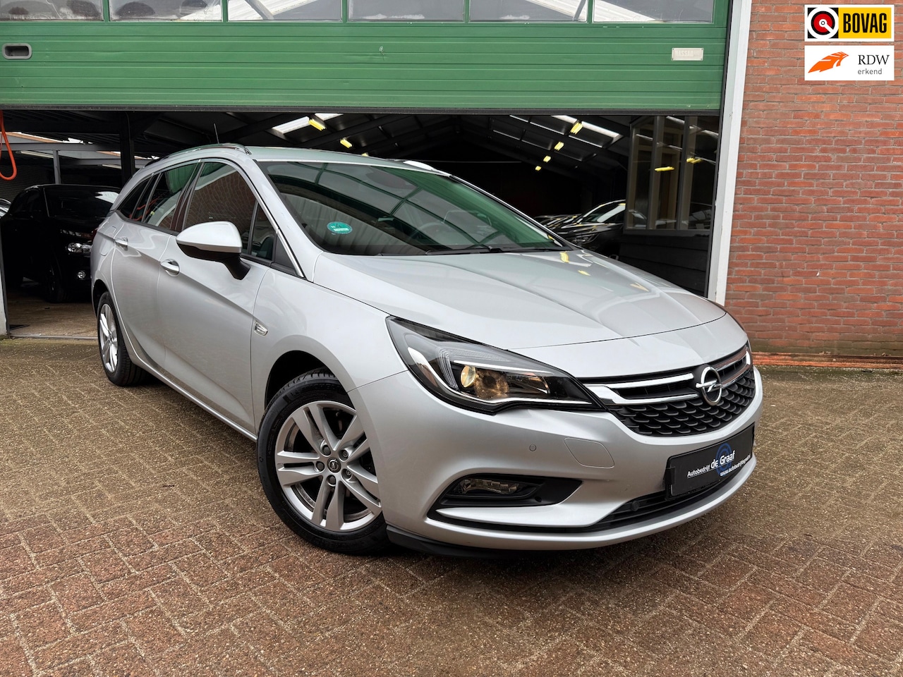 Opel Astra Sports Tourer - 1.4 Turbo 150PK |AUTOMAAT/CRUISE/PDC/KM44500 - AutoWereld.nl