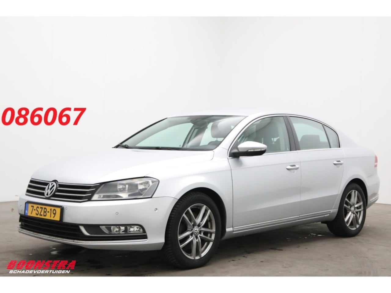 Volkswagen Passat - 1.6 TDI Comfortline BlueMotion Navi Clima Cruise PDC - AutoWereld.nl
