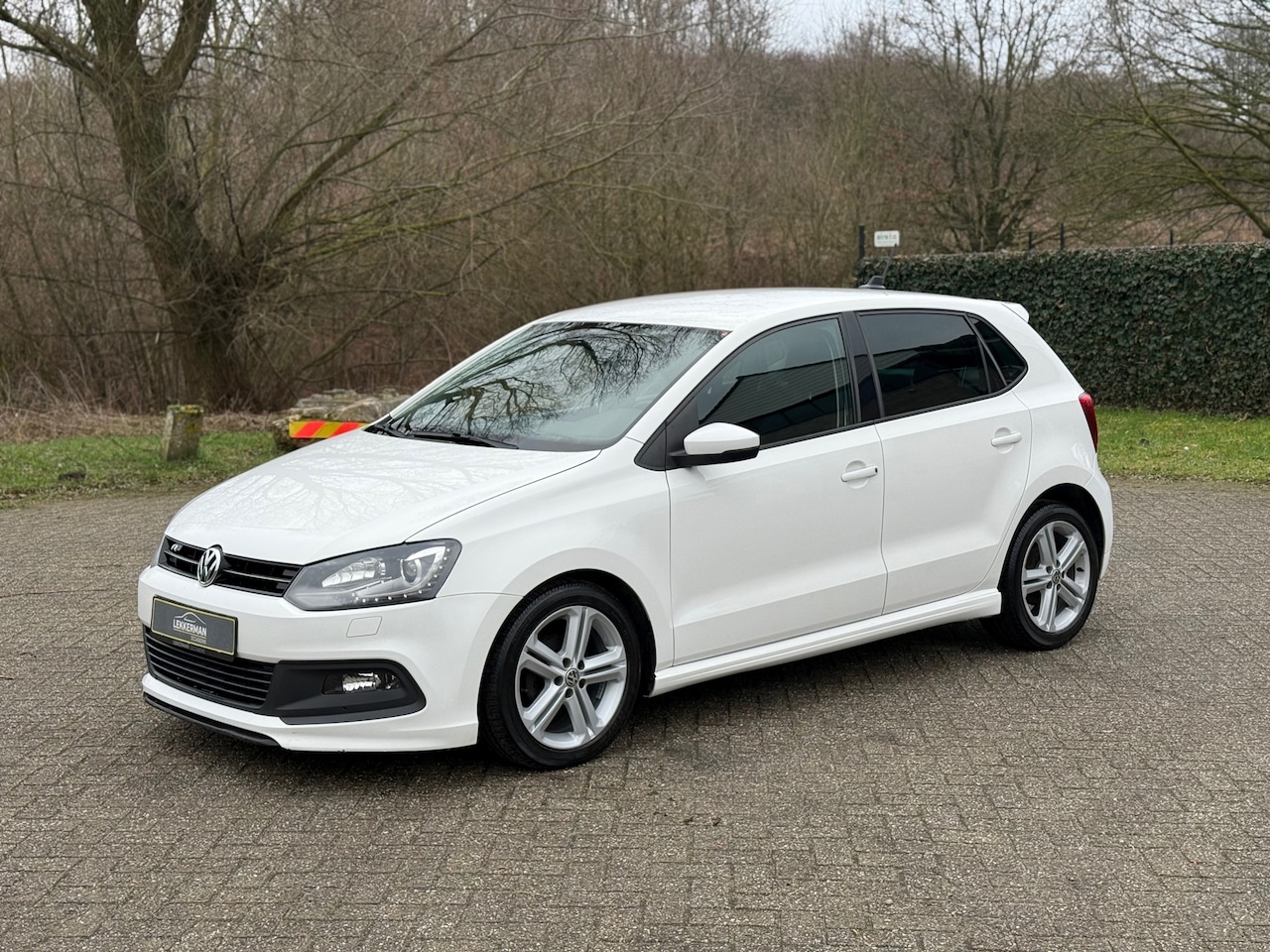 Volkswagen Polo - 1.2 TSI R-LINE 105PK I CRUISE I PDC I CLIMA I STOELVERW I NWE APK - AutoWereld.nl