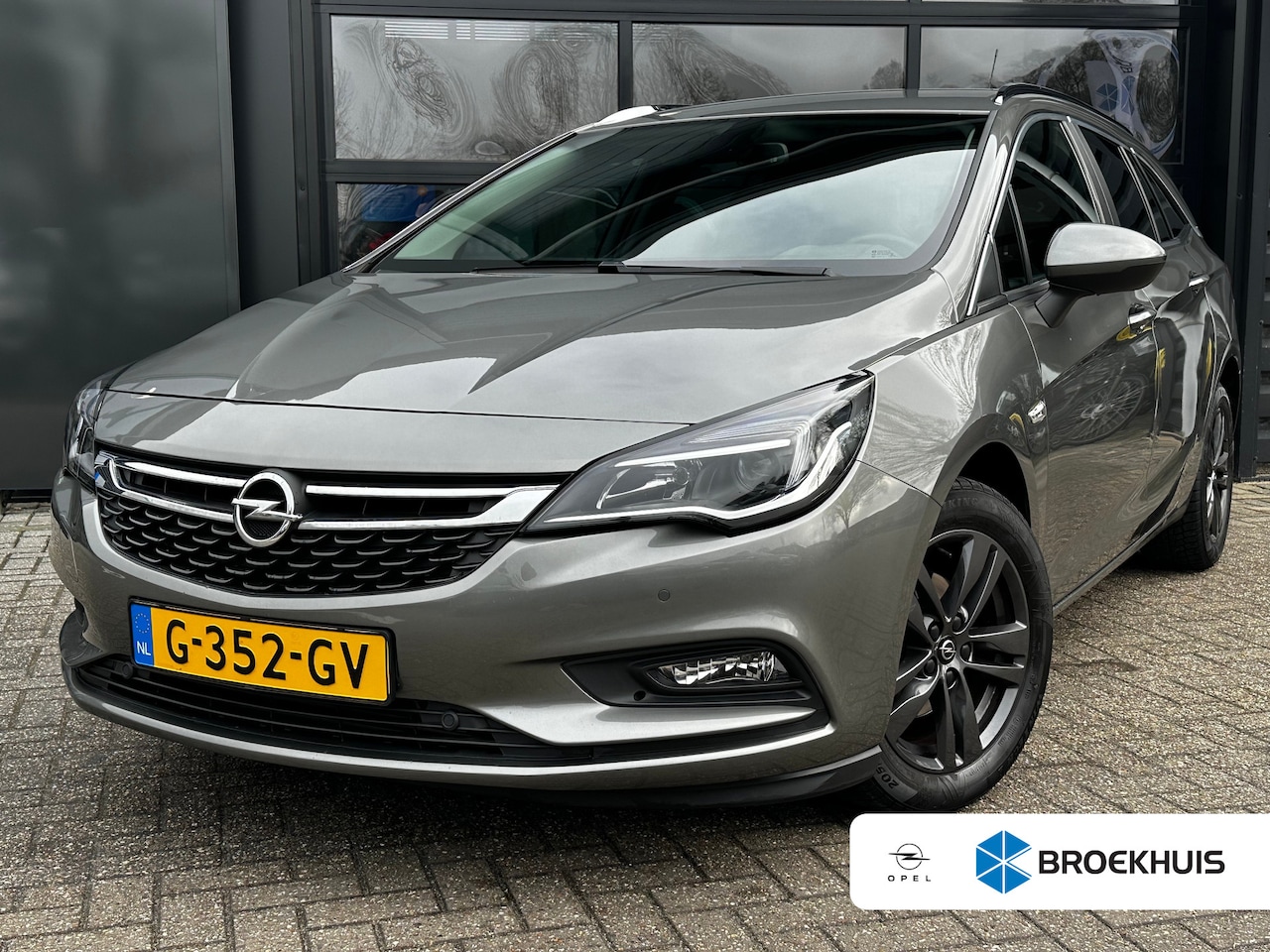 Opel Astra Sports Tourer - 1.0 Turbo 105 PK 120 Jaar Edition | NAVIGATIE + APPLE CARPLAY/ANDROID AUTO| PAKEERSENSOREN - AutoWereld.nl