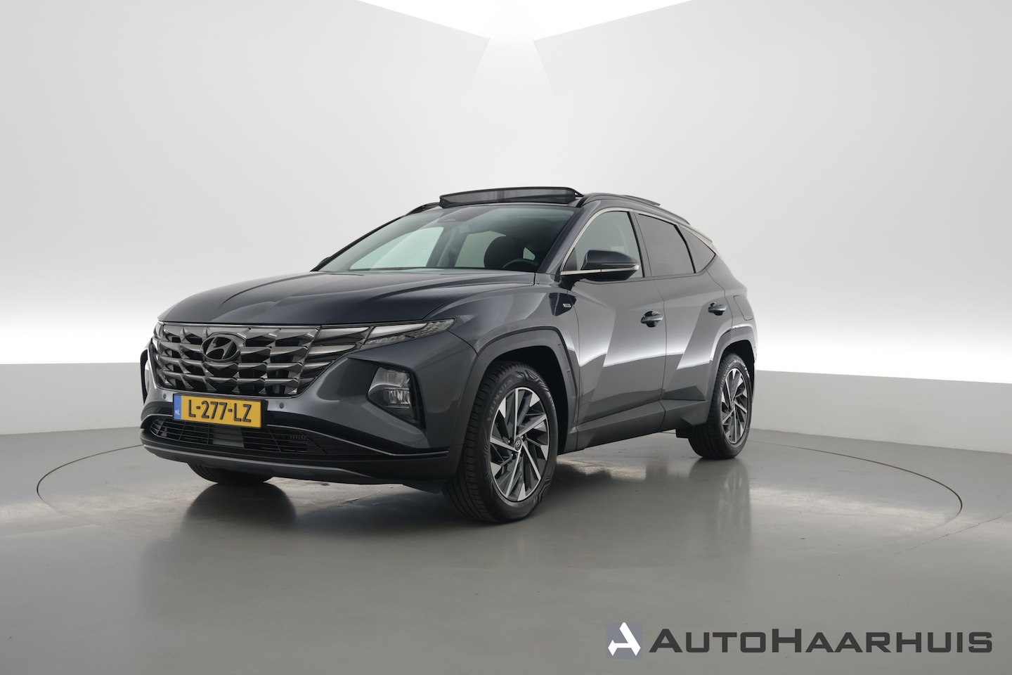 Hyundai Tucson - 1.6 T-GDI MHEV Comfort | Pano | Trekhaak | Camera | Stoel- Stuurverw. | Nav | CarPlay | Cr - AutoWereld.nl