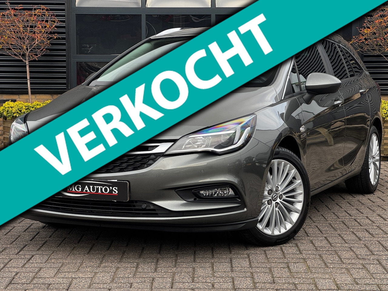 Opel Astra Sports Tourer - 1.4 Turbo 120 Jaar Edition | Trekhaak | Navigatie | Apple CarPlay/Android Auto | Cruise Co - AutoWereld.nl