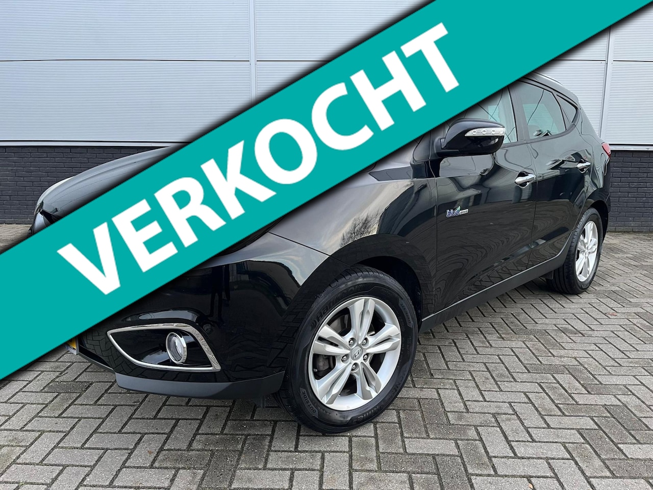 Hyundai ix35 - 1.6i GDI Style Clima - 6 versnellingen - half leder - trekhaak - bluetooth - set winter-wi - AutoWereld.nl