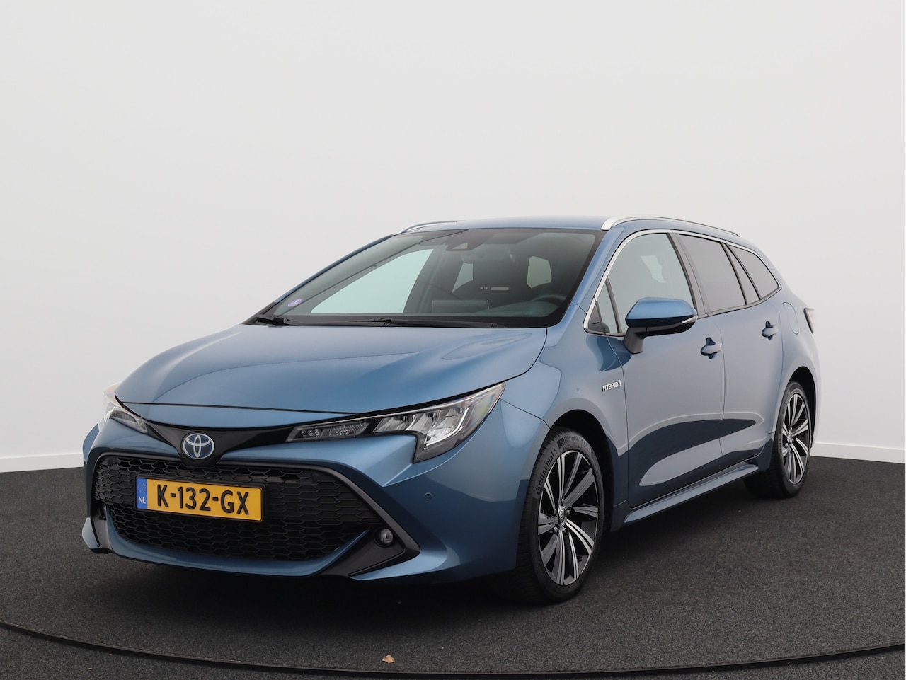 Toyota Corolla Touring Sports - 2.0 Hybrid Business Plus/ lage km/ compleet! - AutoWereld.nl