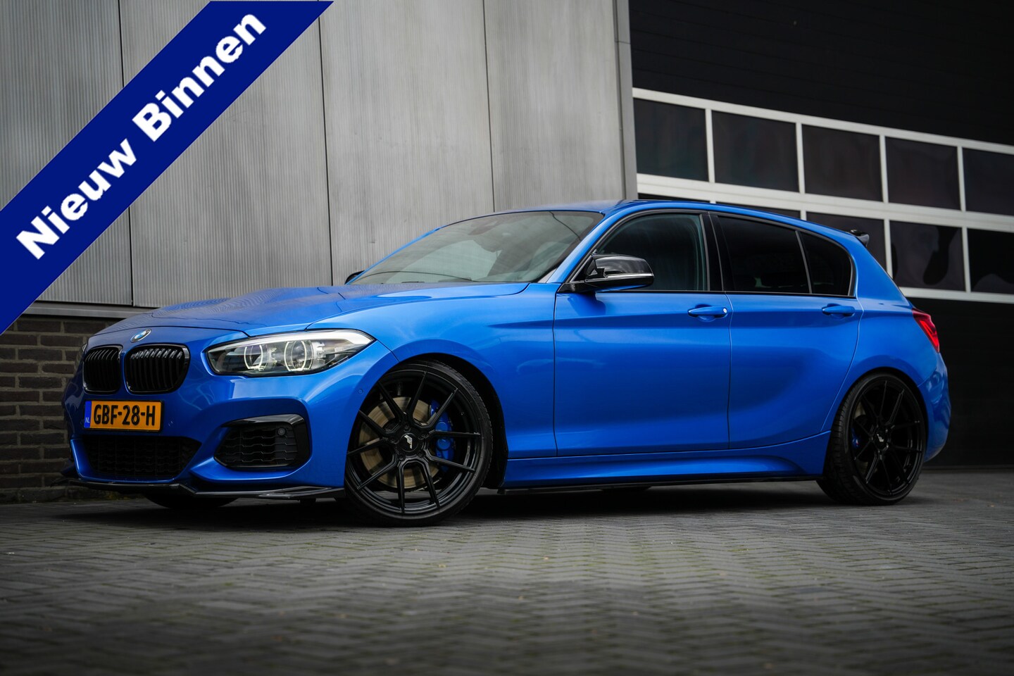 BMW 1-serie - M140i 340 pk xDrive High Executive M-Sportpakket /Maxton-Design/ Leder/ Sport-Stoelen/ Sto - AutoWereld.nl