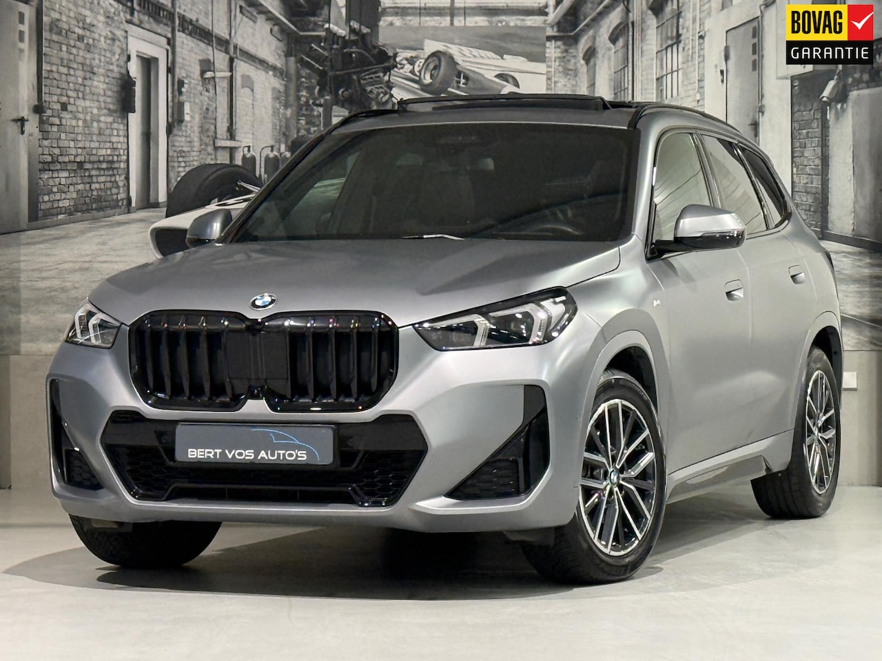 BMW X1 - SDrive18i M Sport Frozen Grey - AutoWereld.nl