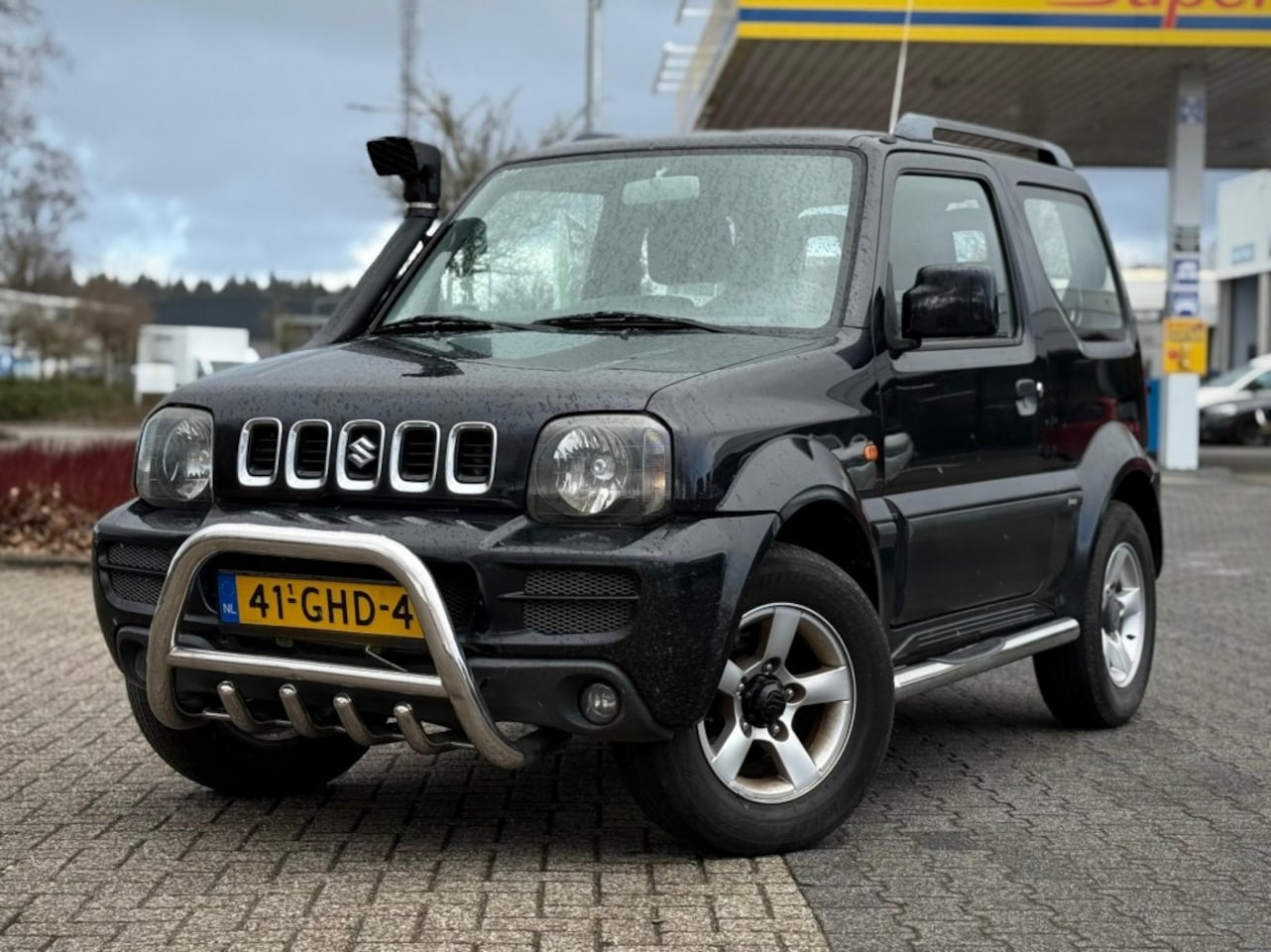 Suzuki Jimny - 1.3 EXCLUSIVE AIRCO RVS PAKKET - AutoWereld.nl