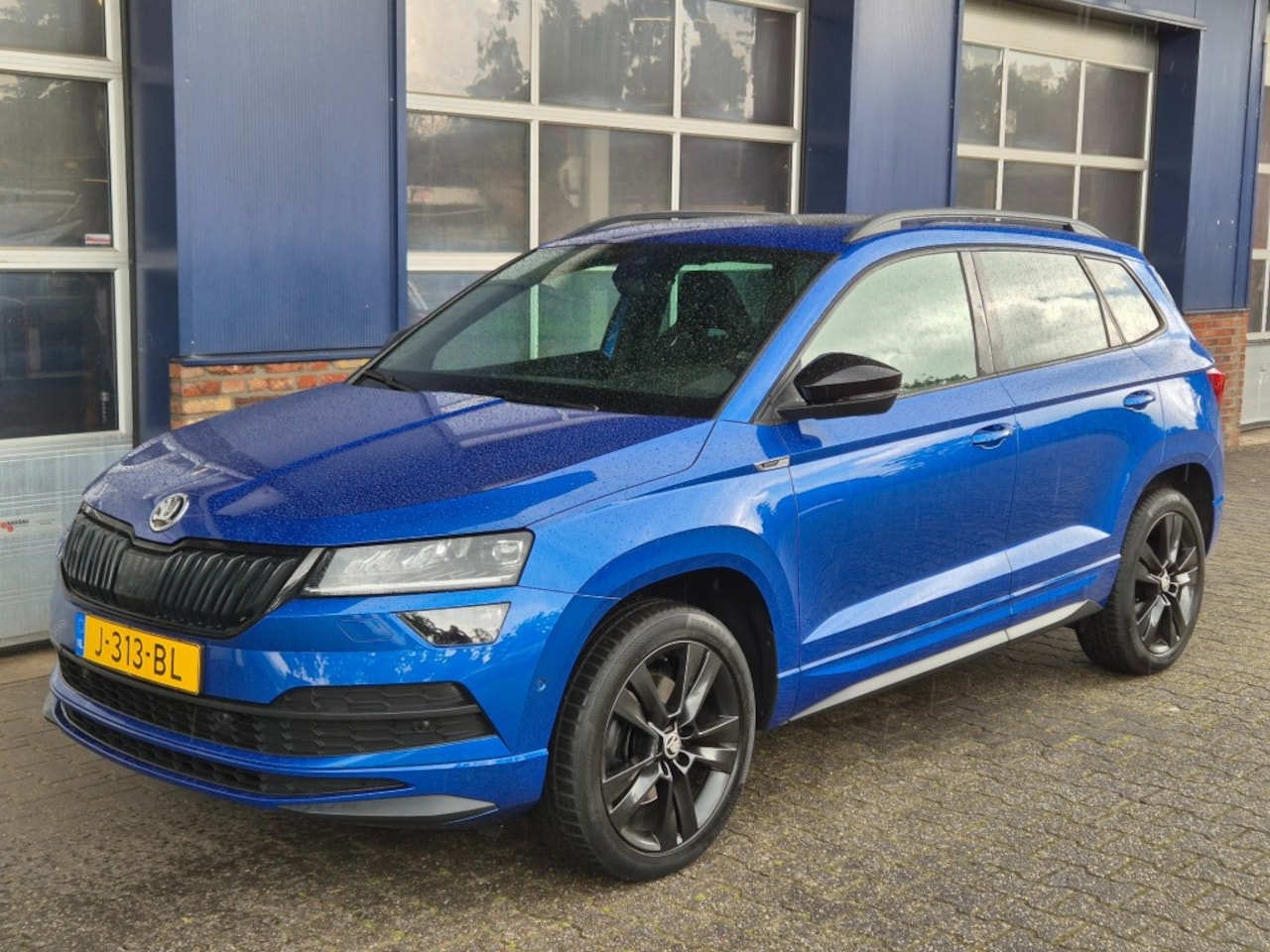 Skoda Karoq - 1.5 TSI Sportline. Business. Aut, Trekhaak, Pano, Stoelverw, Camera ALL IN PRIJS. - AutoWereld.nl