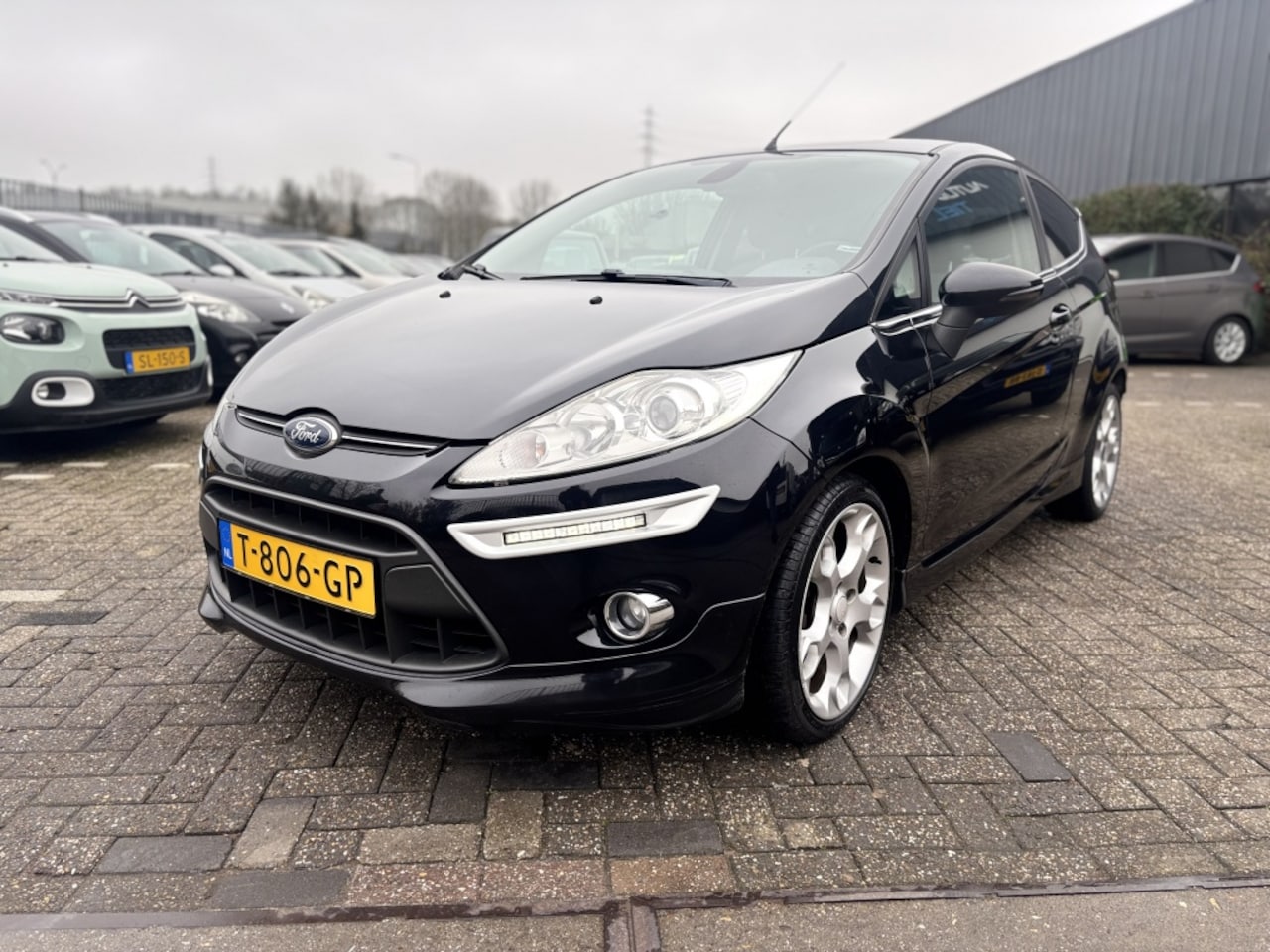 Ford Fiesta - 1.6 Ghia CLIMA!INRUILMOGELIJK! - AutoWereld.nl