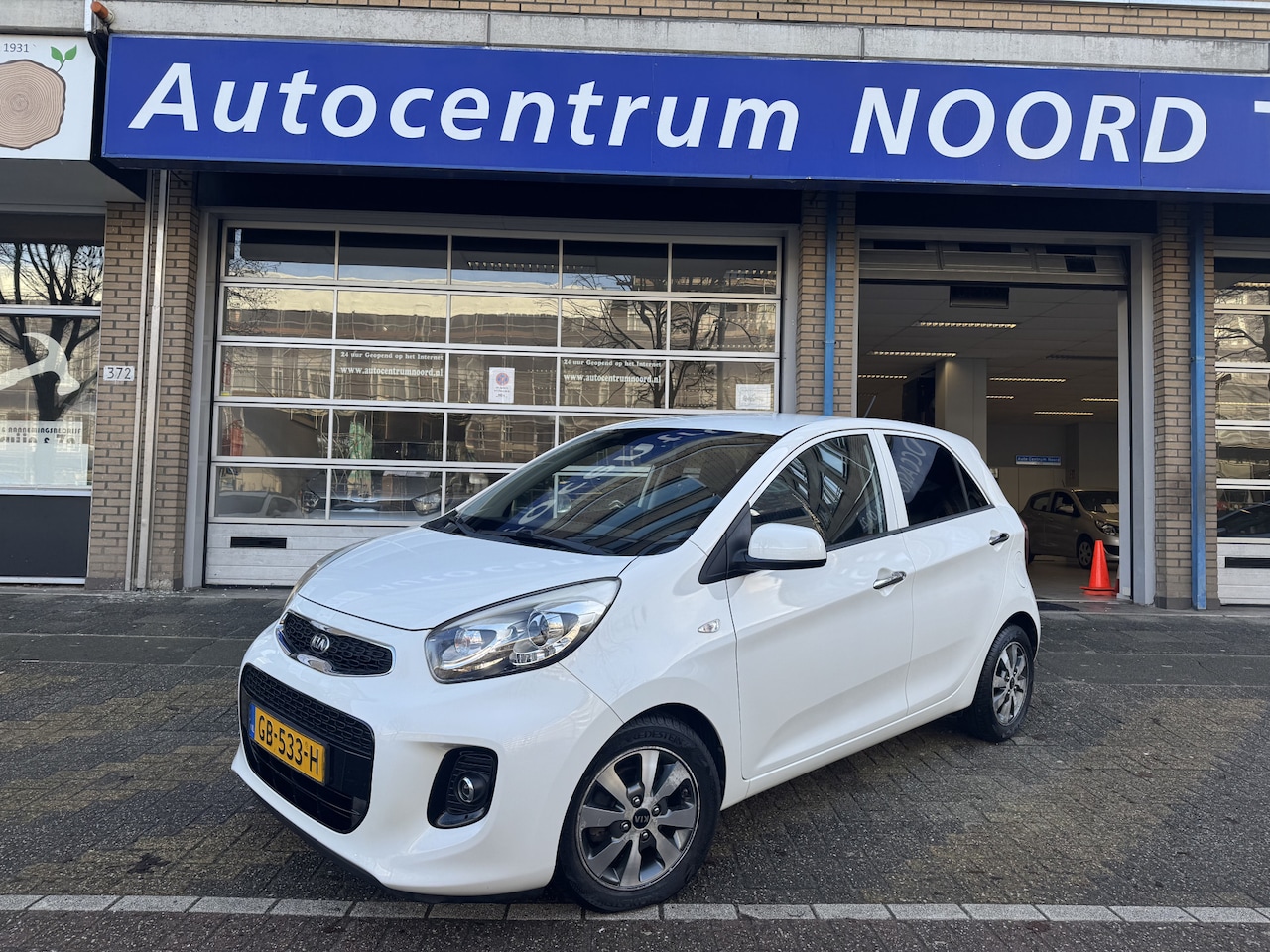 Kia Picanto - 1.0 CVVT First Edition NAP | Climate Control | Cruise Control | LED Dagrijverlichting | Li - AutoWereld.nl