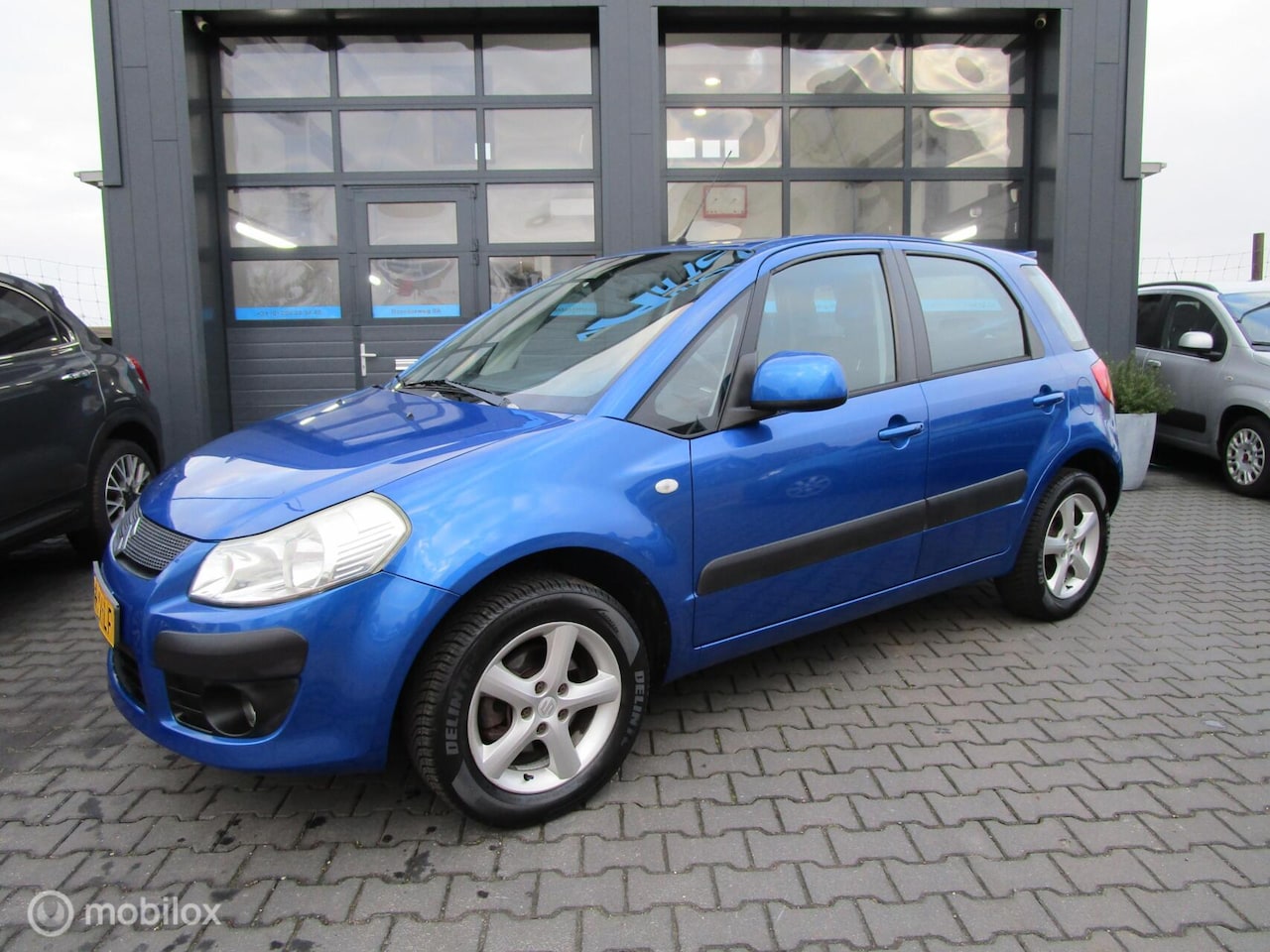 Suzuki SX4 - 1.6 Exclusive Automaat Airco Trekhaak Org NL - AutoWereld.nl