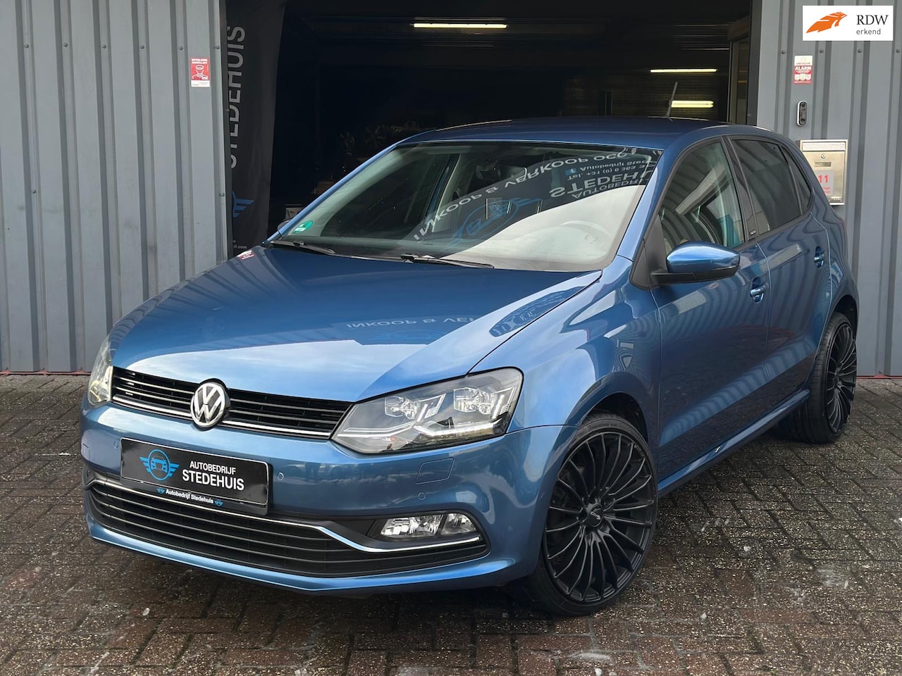 Volkswagen Polo - 1.2 TSI Highline Navigatie l PDC l Led - AutoWereld.nl