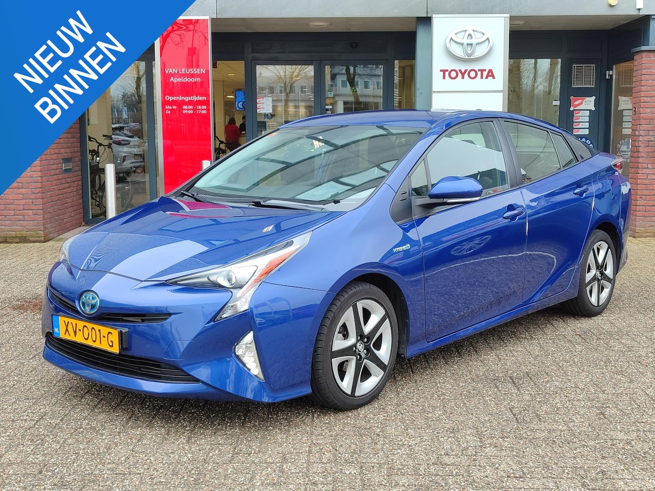 Toyota Prius - 1.8 Hybrid DYNAMIC TREKHAAK HEAD-UP STOELVERW KEYLESS LM-VELGEN CAMERA CLIMA AD-CRUISE BLU - AutoWereld.nl