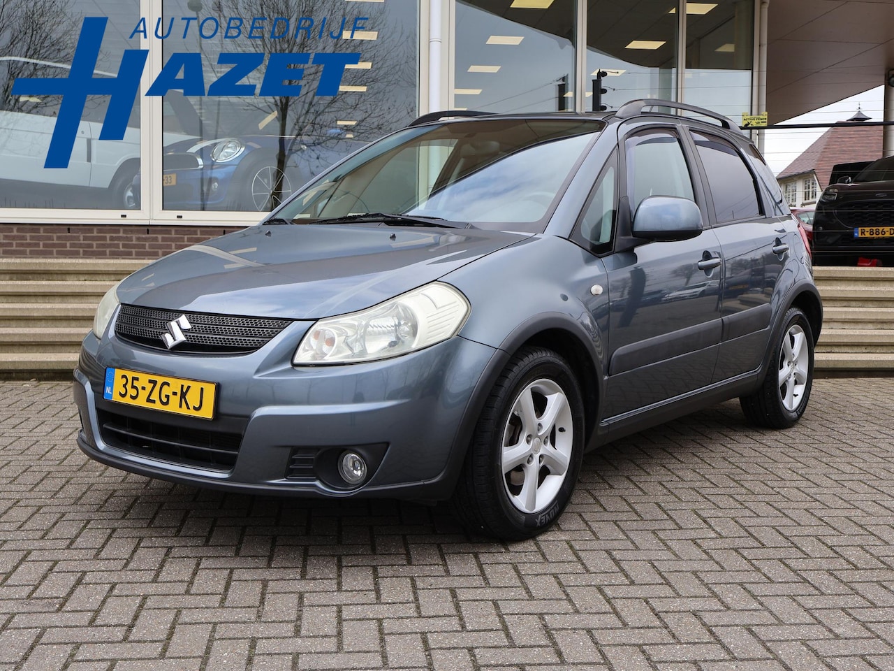 Suzuki SX4 - 1.6 SHOGUN + TREKHAAK | AIRCO | LMV - AutoWereld.nl
