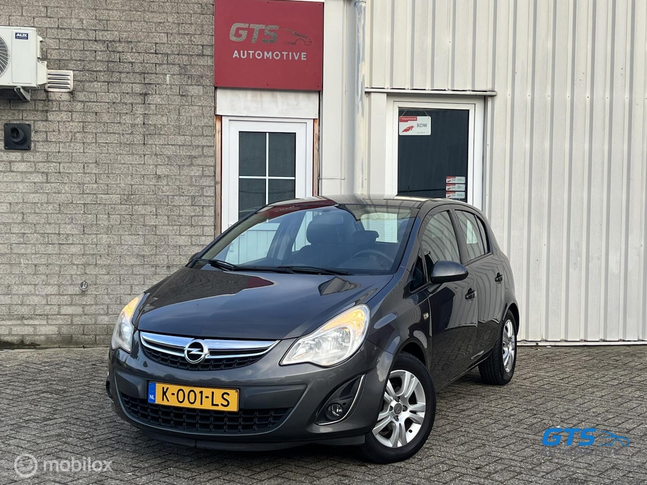 Opel Corsa - 1.2-16V Rhythm 2012 Airco CruiseCnt Nw.APK - AutoWereld.nl