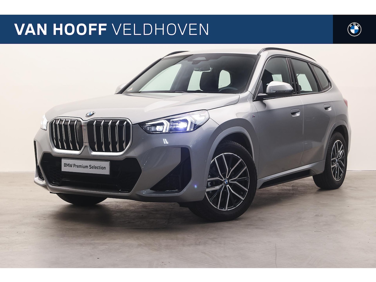 BMW X1 - sDrive18i M Sport Automaat / M Adaptief onderstel / Sportstoelen / Comfort Access / Achter - AutoWereld.nl