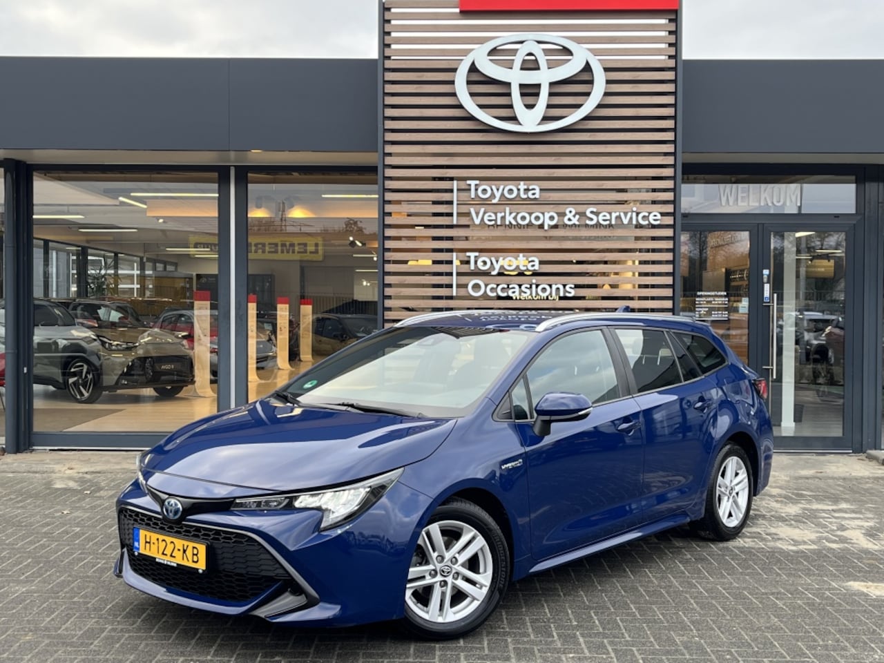 Toyota Corolla Touring Sports - 1.8 Hybrid Active | LED | - AutoWereld.nl