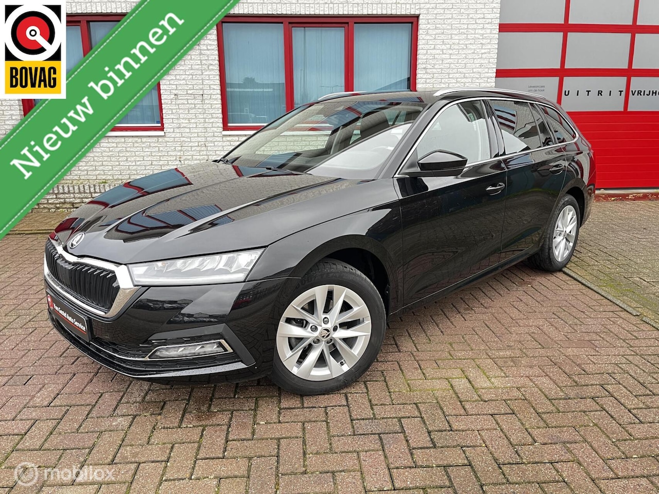 Skoda Octavia Combi - 1.0 e-TSI Business Edition PANODAK/AUTOMAAT - AutoWereld.nl