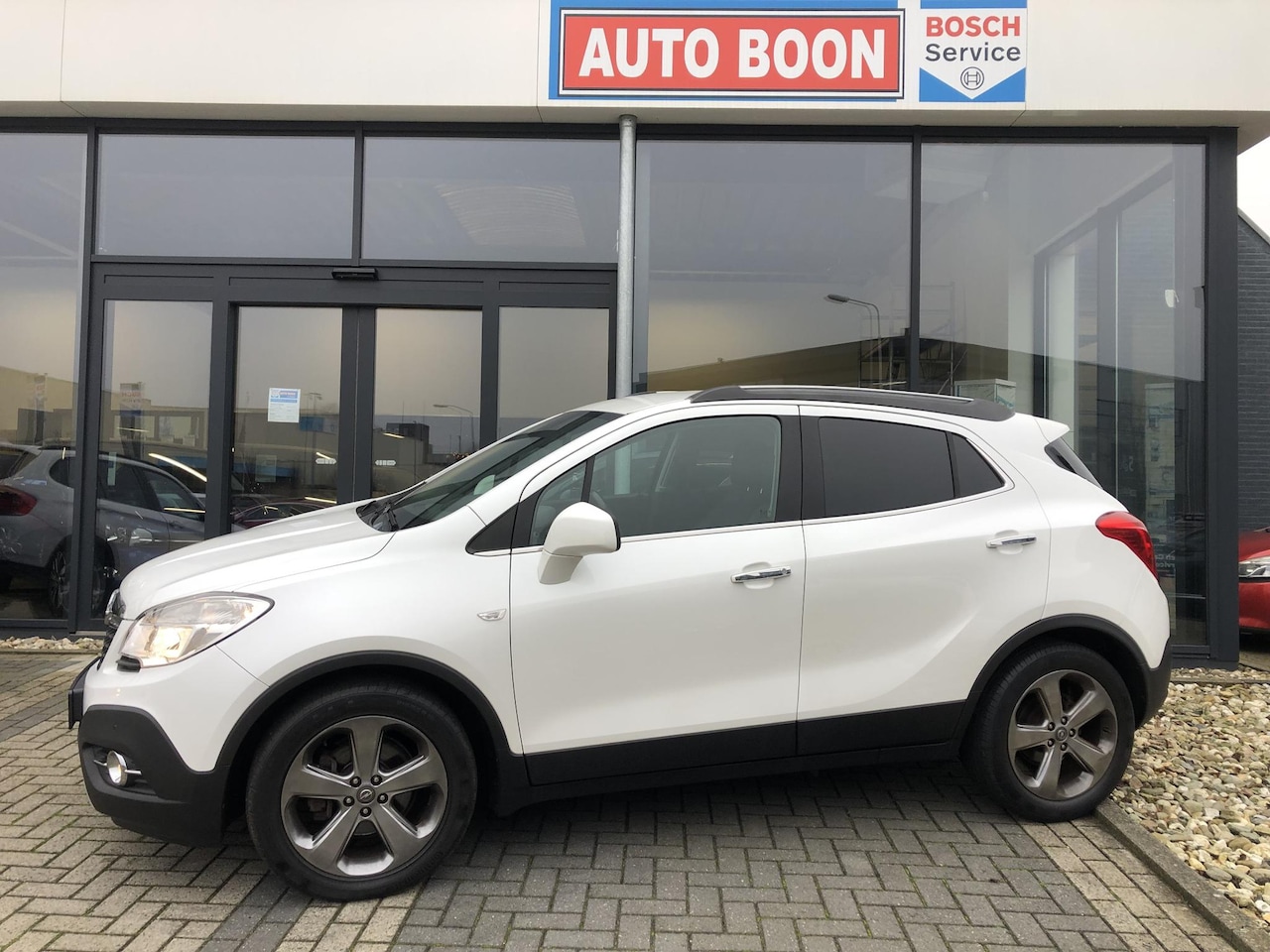 Opel Mokka - 1.6 116PK COSMO : NAVI/2XPDC/P-CAM/CLIMA/ MEDIA/STOELVERWARMING/STUURVERWARMING/FIETSENDR. - AutoWereld.nl